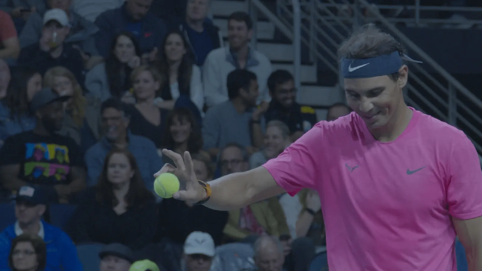 Rafael Nadal serving to a packed arena at the Atlanta Challenge, sports event photography by Network Frequency
